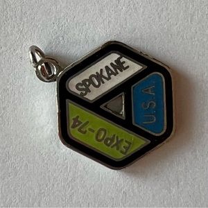 Vintage, silvertone EXPO 74 Spokane charm pendant